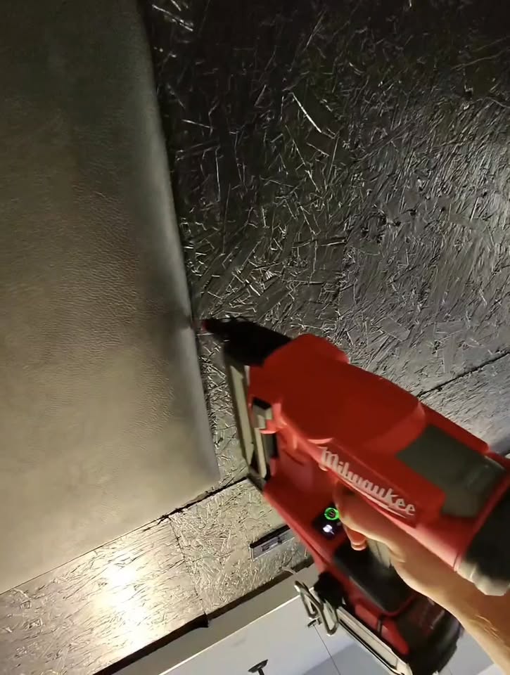 Acoustic panel being installed in a Custom Sims simulator enclosure