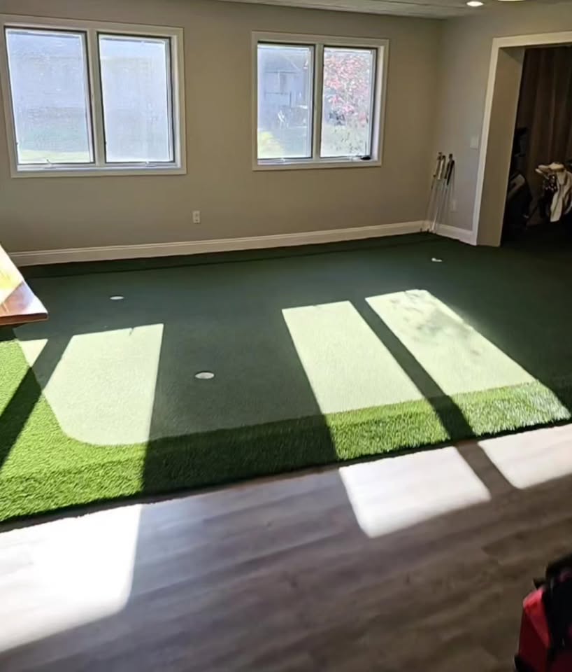 Custom indoor putting green with true roll and contoured breaks